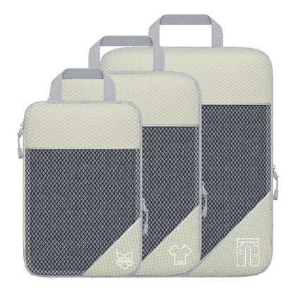 Set of three travel packing cubes with gray and green design on a white background